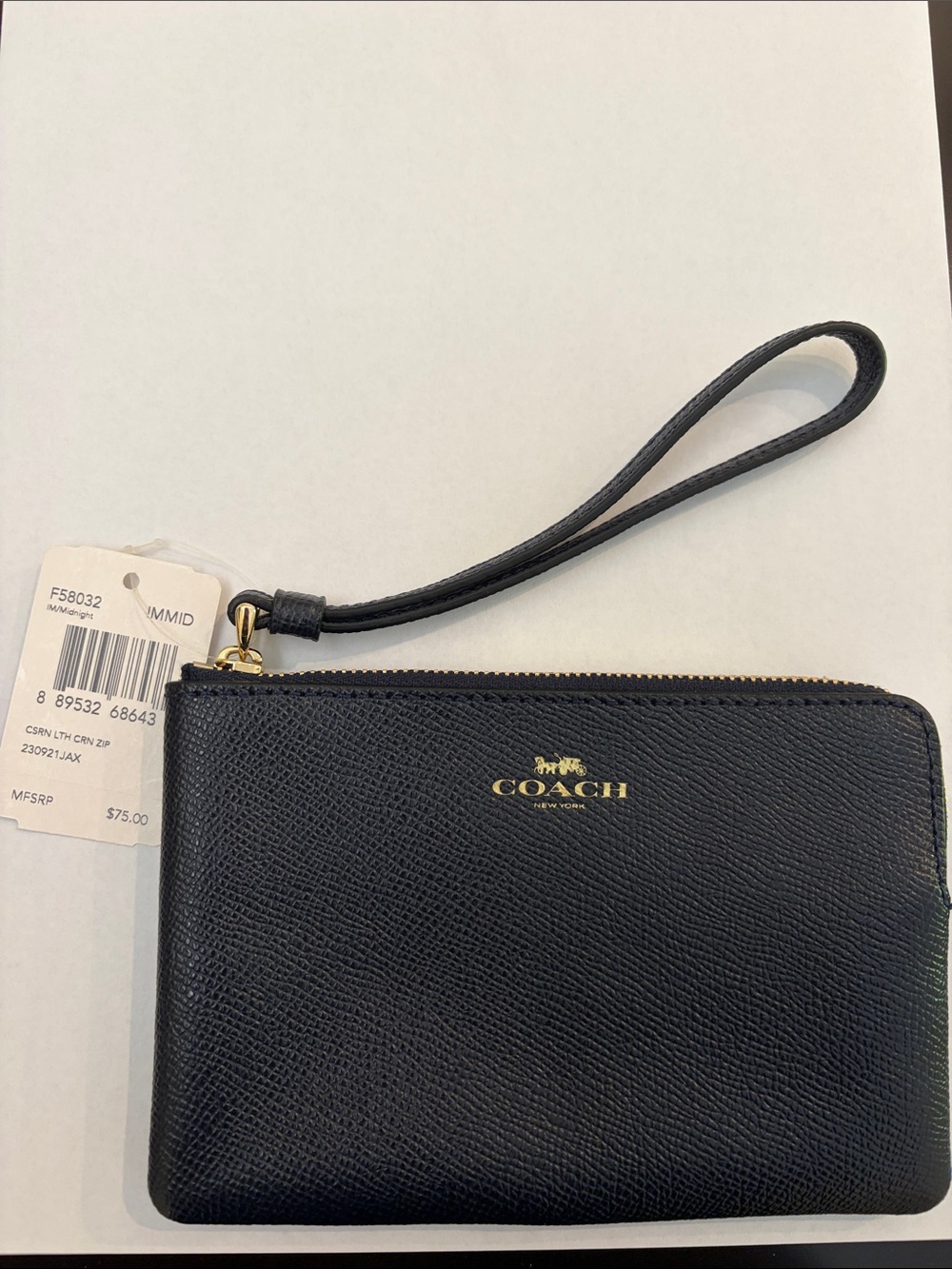 NWT — Coach Navy Leather Zip Wristlet with Gold Logo